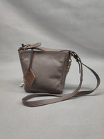 Load image into Gallery viewer, Aaliyah taupe milled sling bag
